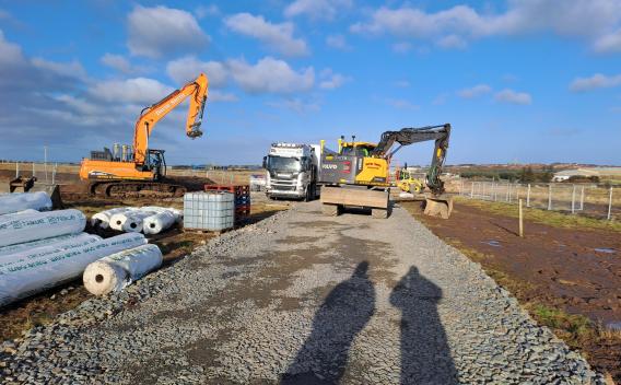 Diggers working on the ground