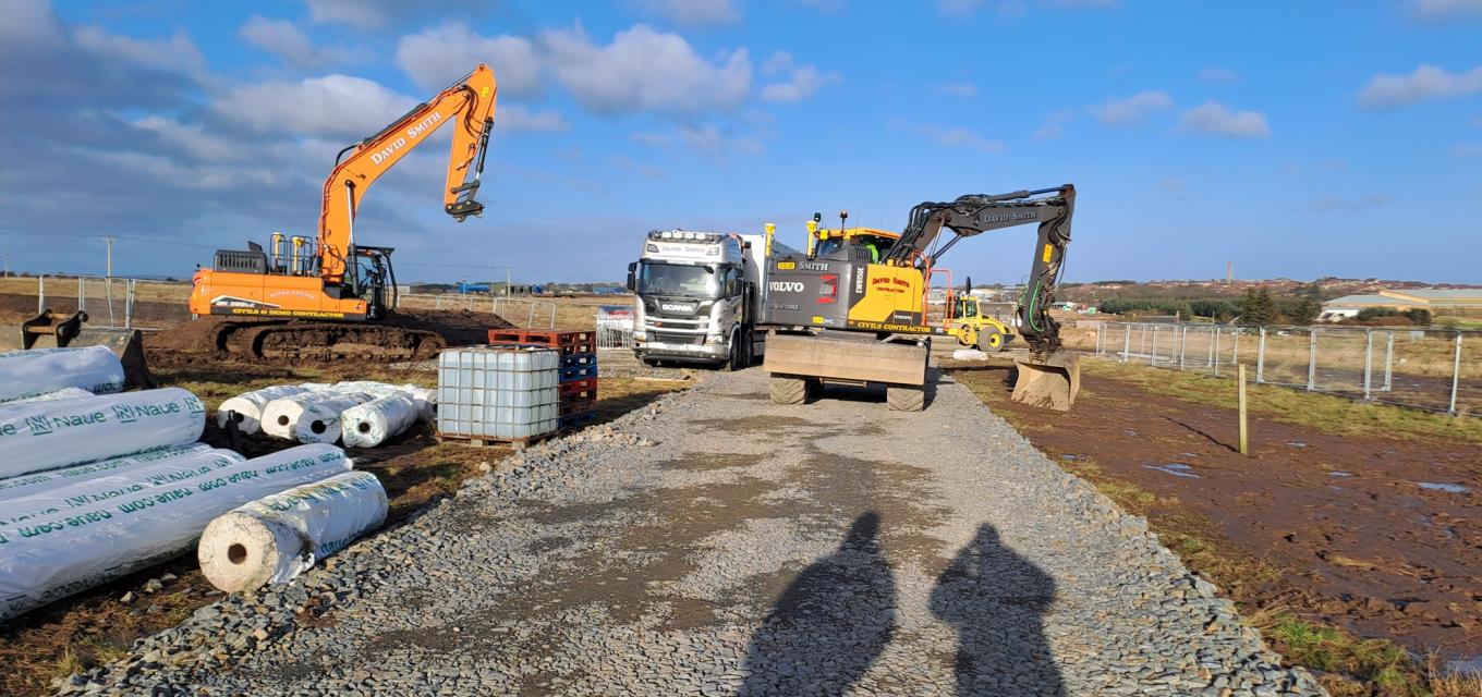 Diggers working on the ground